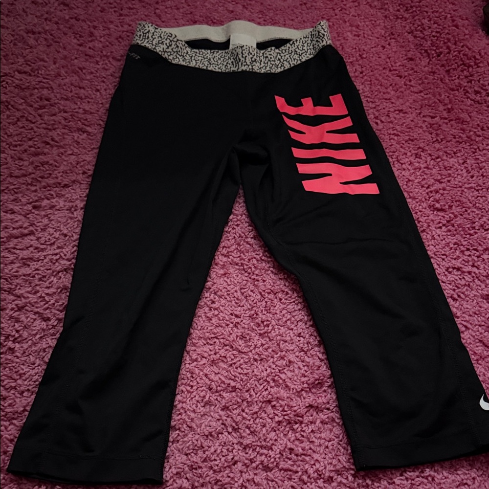 Nike Black Capri Leggings with Hot Pink Side Logo and Patterned Waistband